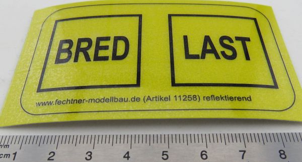 Klistermärke varningsskylt "BRED LAST" REFLEX gjord av självhäftande