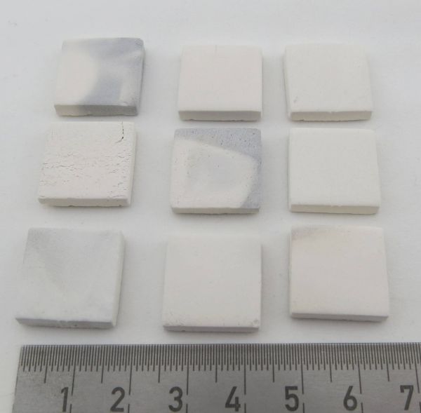 Tiles, white, partly marbled. 18 x 18 x 3mm. 100