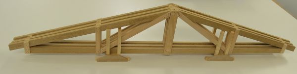 Replica of roof trusses in wood with transport frame