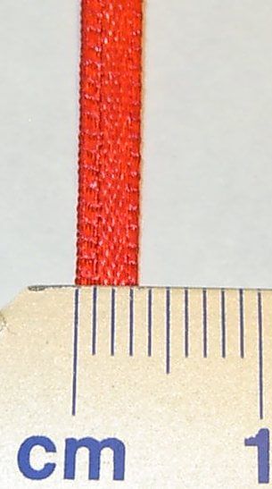 Spännband (textil) om 3mm bred 50cm lång, röd, för