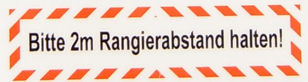 etiqueta de texto "Rangierabstand 2m" auto 1-line