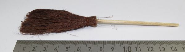 1 flat broom ca.15cm long, dark