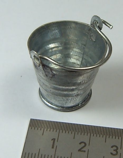 1x tin bucket, galvanized, 2,2cm height. Approximately 24mm diameter
