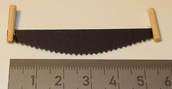 1x tree saw about 6,0cm. With curved blade. Black