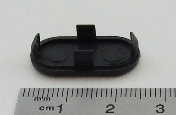 1 tapón ciego (agujero alargado), plástico, negro. Para cubrir