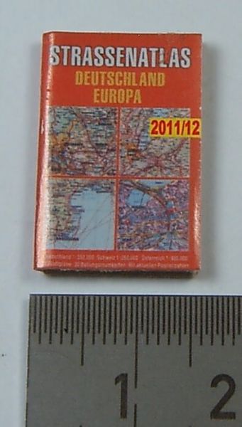 Miniature magazine "road atlas" as the embodiment