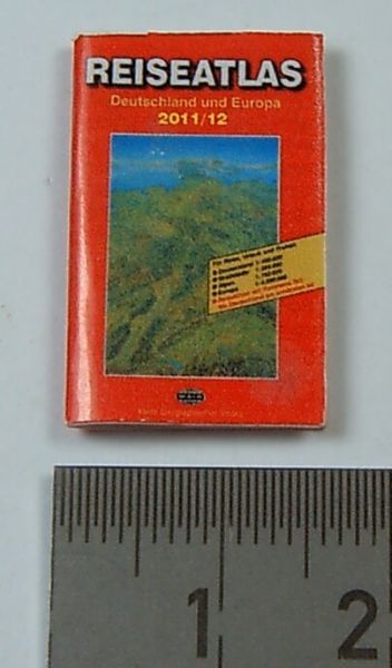 Miniature magazine "Travel Atlas" as the embodiment