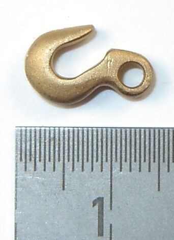 1 brass investment casting Hook. With stop eyelet. overall height