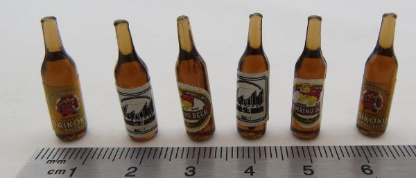 1 ølflaske, brun, cirka 6x24 mm. Med forskellige etiketter. -K