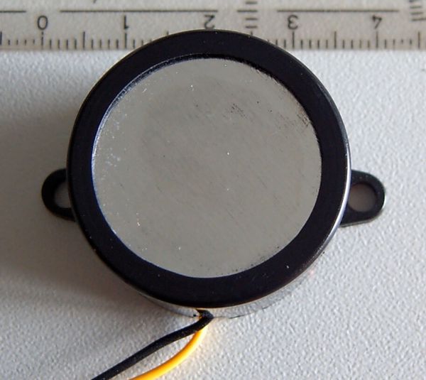 1 piezo buzzer with piercing interval tone. For 12V