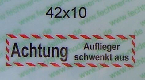 Tekst Znak "Uwaga Auflie.schwenkt od siebie"