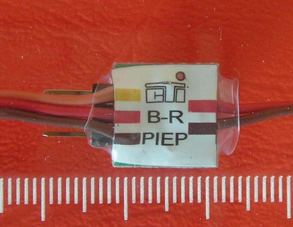 Switching module for braking and reversing lights with